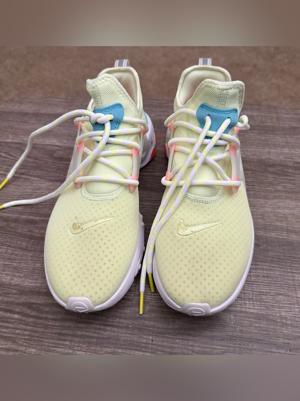 Nike Men's Light Yellow Sneakers with Blue Tongue Accents